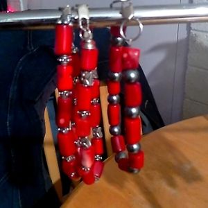 Set of 3 coral beaded bracelets togal clasp stretch cord.